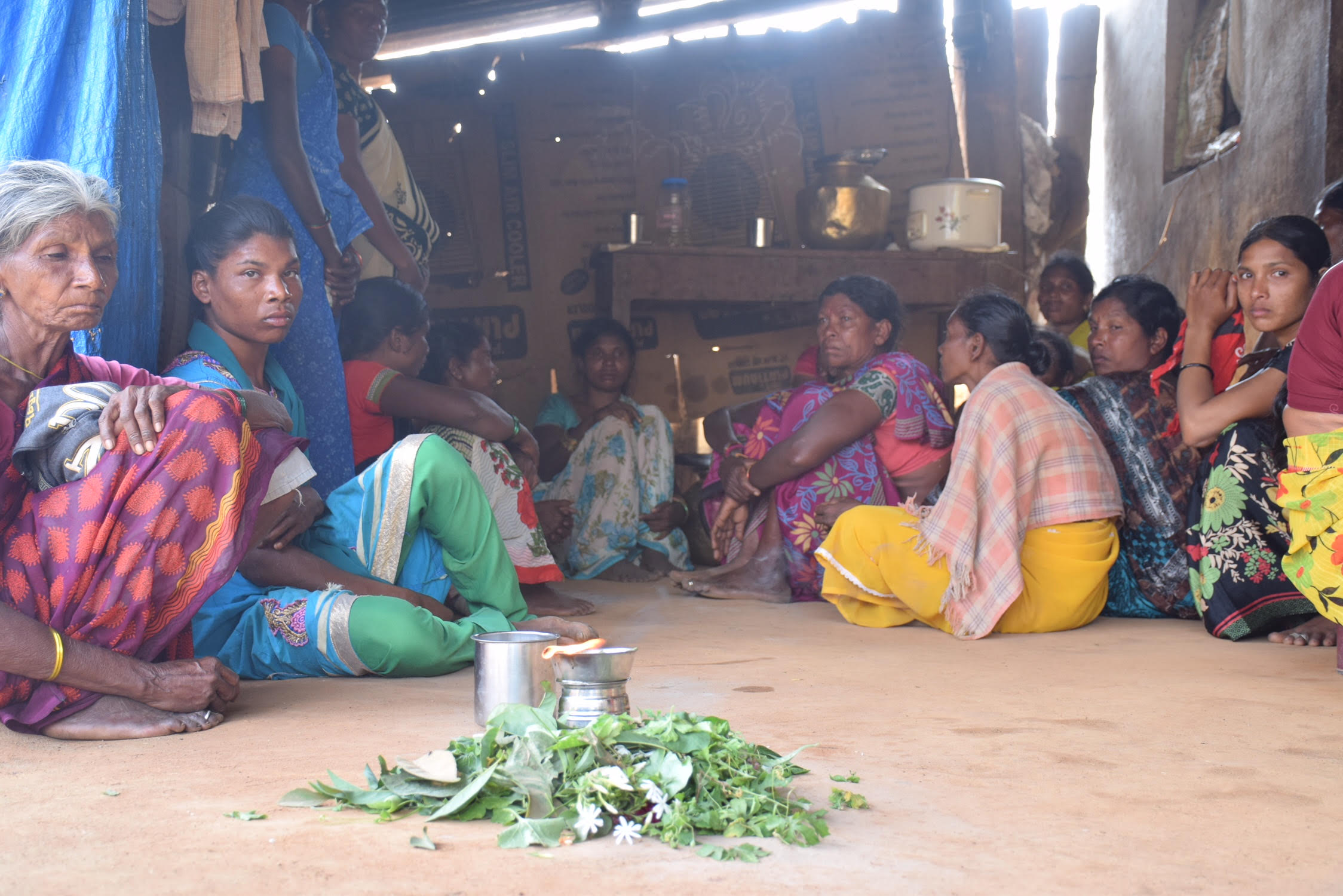 Etti Seenu’s wife Kaushalya and other women mourn his death at his house in Marigudem village. Credit: Sukanya Shantha