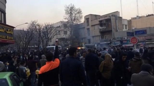 People protest in Tehran, Iran December 30, 2017 in this still image from a video obtained by Reuters.