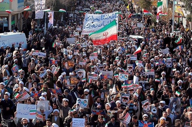 People take part in pro-government rallies, Iran, January 3, 2018. Tasnim News Agency/Handout via Reuters