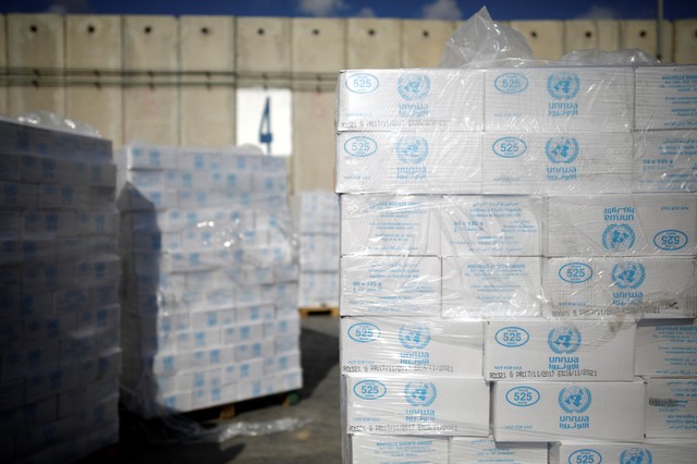 Boxes containing aid from the UN Relief and Works Agency (UNRWA) are seen ahead of their transfer to the Gaza Strip, inside the Kerem Shalom border crossing terminal between Israel and Gaza Strip January 16, 2018. Reuters/Amir Cohen