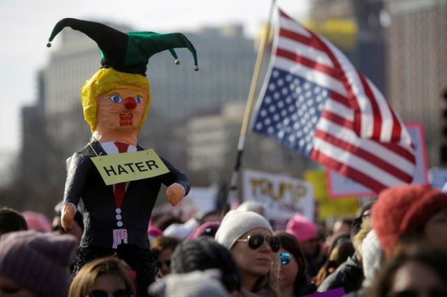 People take part in the Women's March in Chicago, Illinois, US, January 20, 2018. Credit: Reuters/Joshua Lott