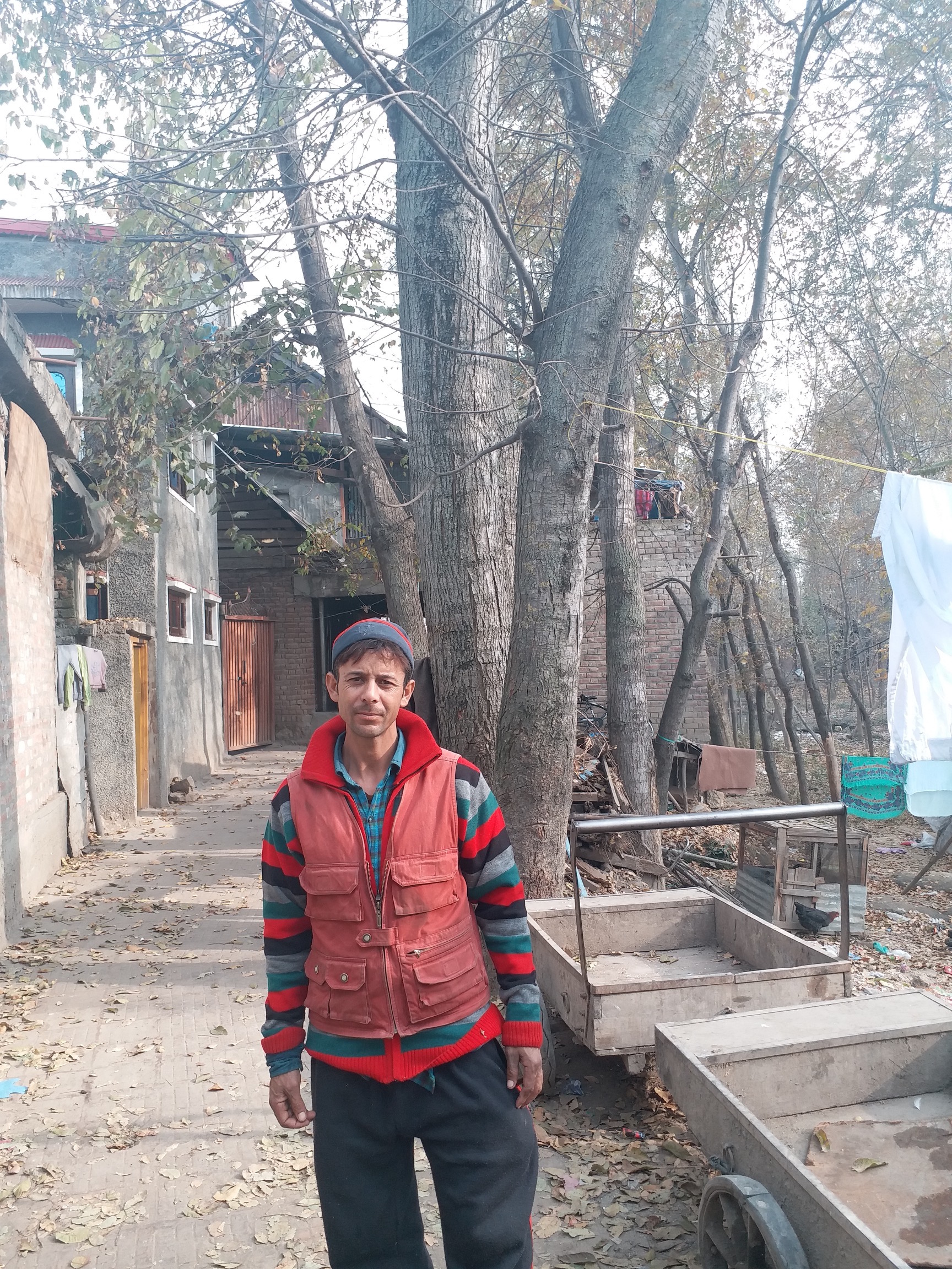 Abdul Rashid Sheikh, father of pellet victim Asif, outside his house at Khanabal, Anantnag in Jammu and Kashmir. Credit: Anando Bhakto