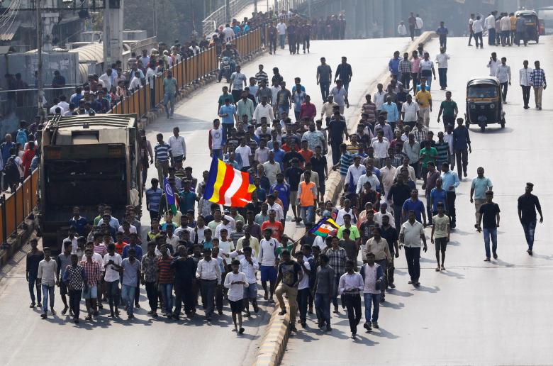 Members of the Dalit community shout slogans as they participate in a protest rally in Mumbai, India, January 3, 2018. Credit: Reuters/Danish Siddiqui