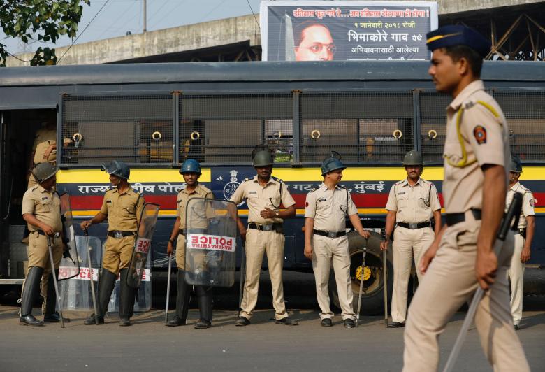 Policemen stand guard at a traffic junction in Mumbai, India, January 3, 2018. Credit: Reuters/Danish Siddiqui