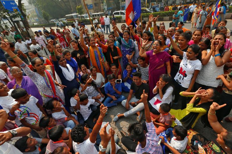 Members of the Dalit community shout slogans as they block a road during a protest in Mumbai, India, January 3, 2018. Credit: Reuters/Shailesh Andrade