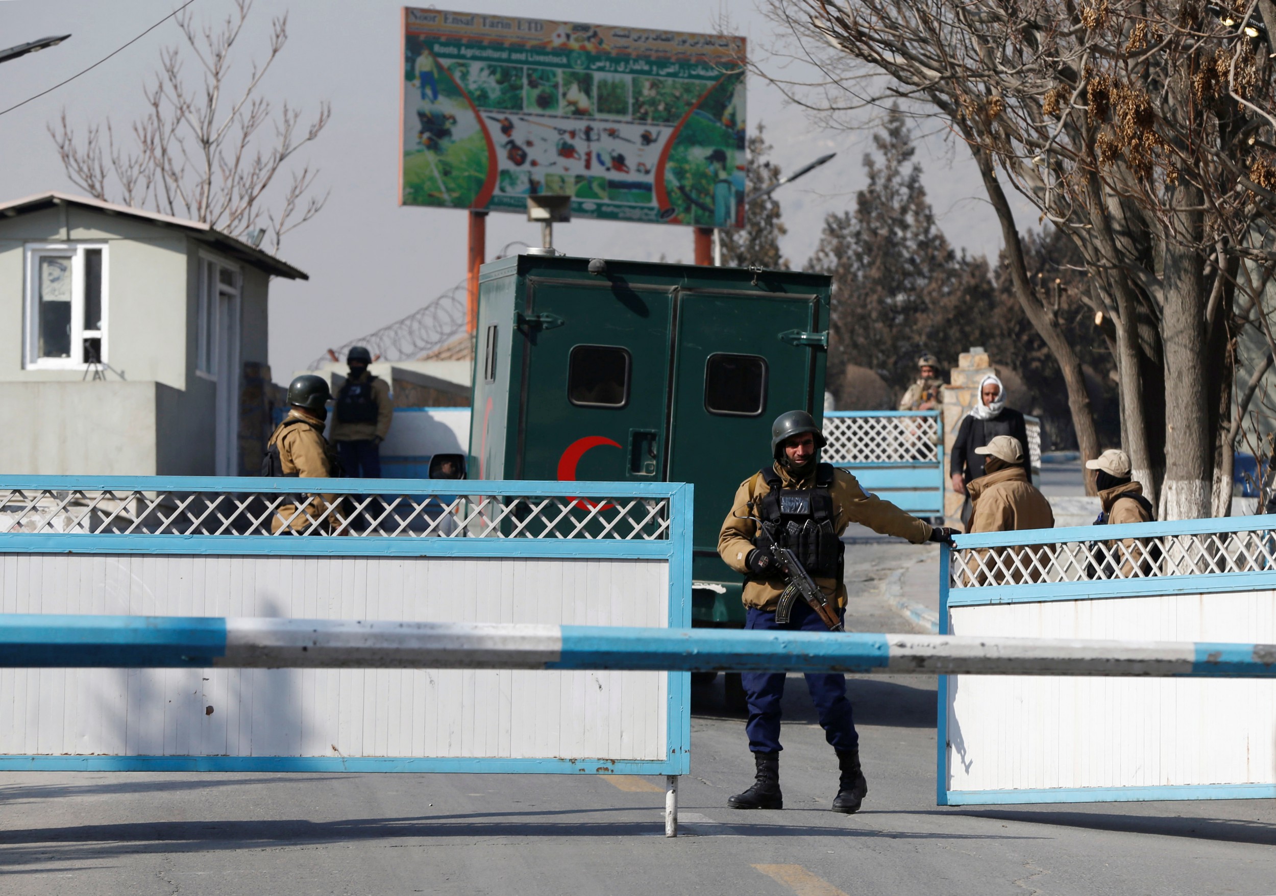 Afghan security forces stand guard at the entrance gate of the Intercontinental Hotel a day after an attack in Kabul, Afghanistan January 22, 2018. Credit: Reuters/Omar Sobhani