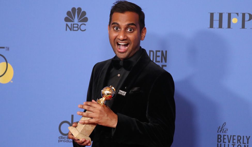 Aziz Ansari wearing a 'Times Up' pin at the Golden Globe Awards. Credit: Reuters