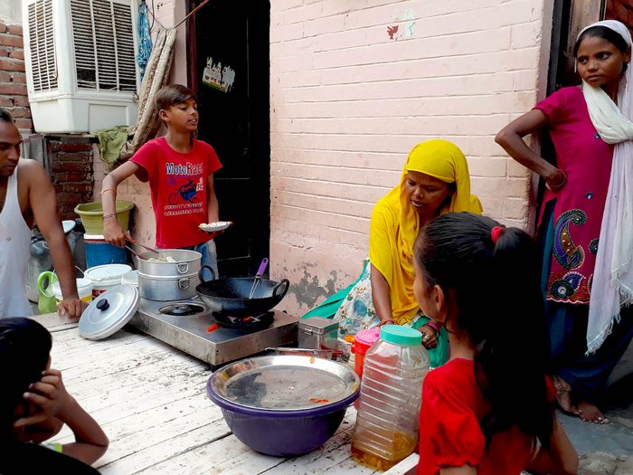 Laxmi's son Arjun and has been selling snacks off a pushcart for over a year. Credit: Bhasha Singh/People's Archive of Rural India