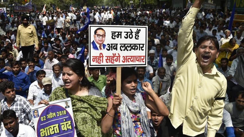 Members of Dalit community raise slogans during Bharat Bandh against the alleged dilution of the Scheduled Castes/Scheduled Tribes Act, in New Delhi. Credit: PTI