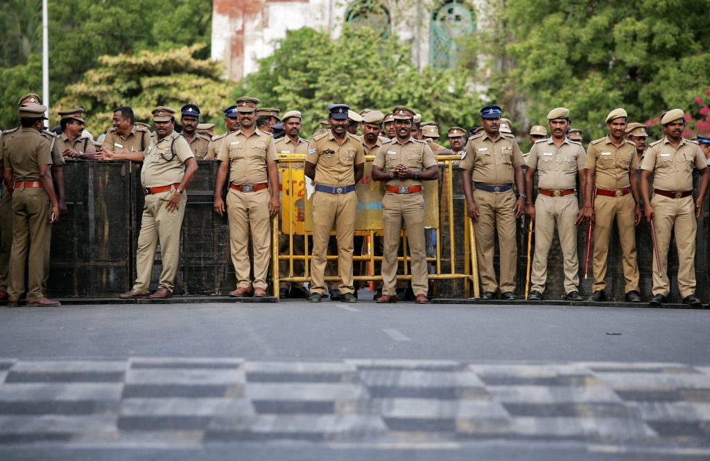 Policemen stand guard ahead of a protest, after at least 13 people were killed when police fired on protesters seeking closure of plant on environmental grounds in town of Thoothukudi in southern state of Tamil Nadu, in Chennai, India, May 24, 2018. Credits: REUTERS/P.Ravikumar