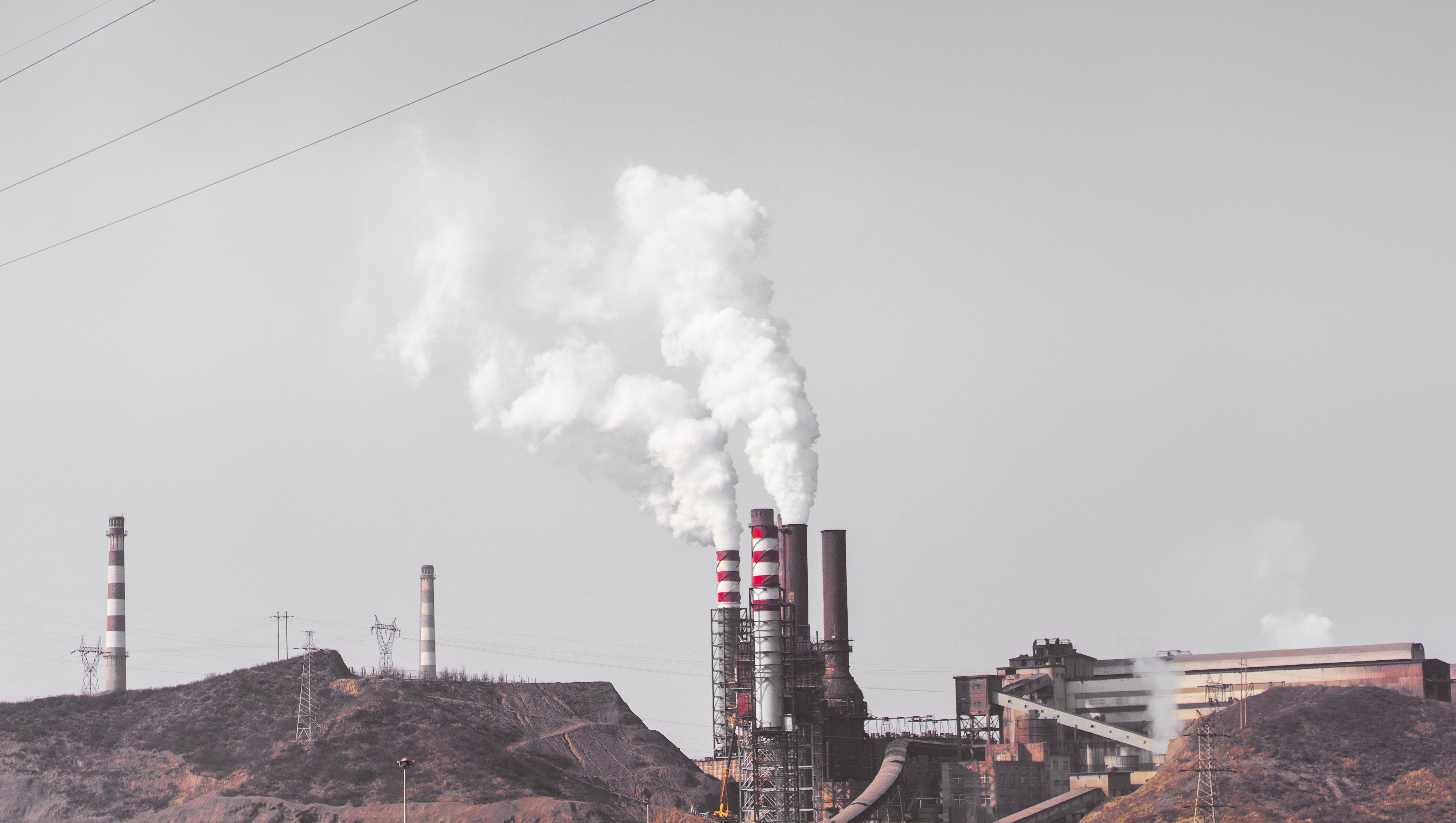 an important aspect of knowing the sources of pollution is emissions monitoring and making that information available in real-time for further analysis. Credit: JuniperPhoton/Unsplash