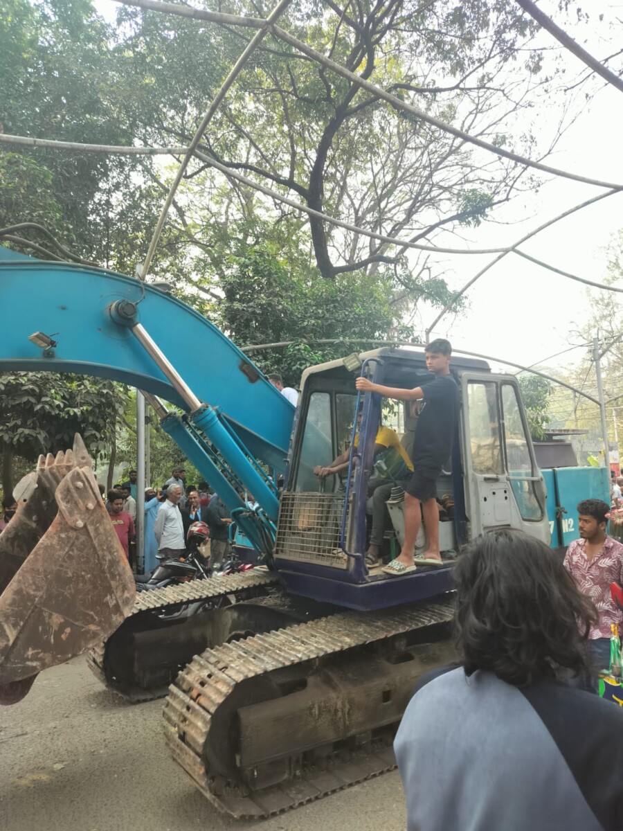 The bulldozer which the crowd used to vandalise Mujibur Rehman's house.