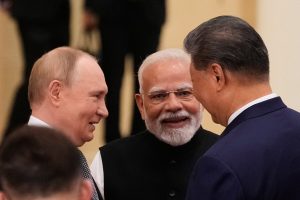 Russian President Vladimir Putin, from left, Indian Prime Minister Narendra Modi and Chinese President Xi Jinping. Photo: AP/PTI