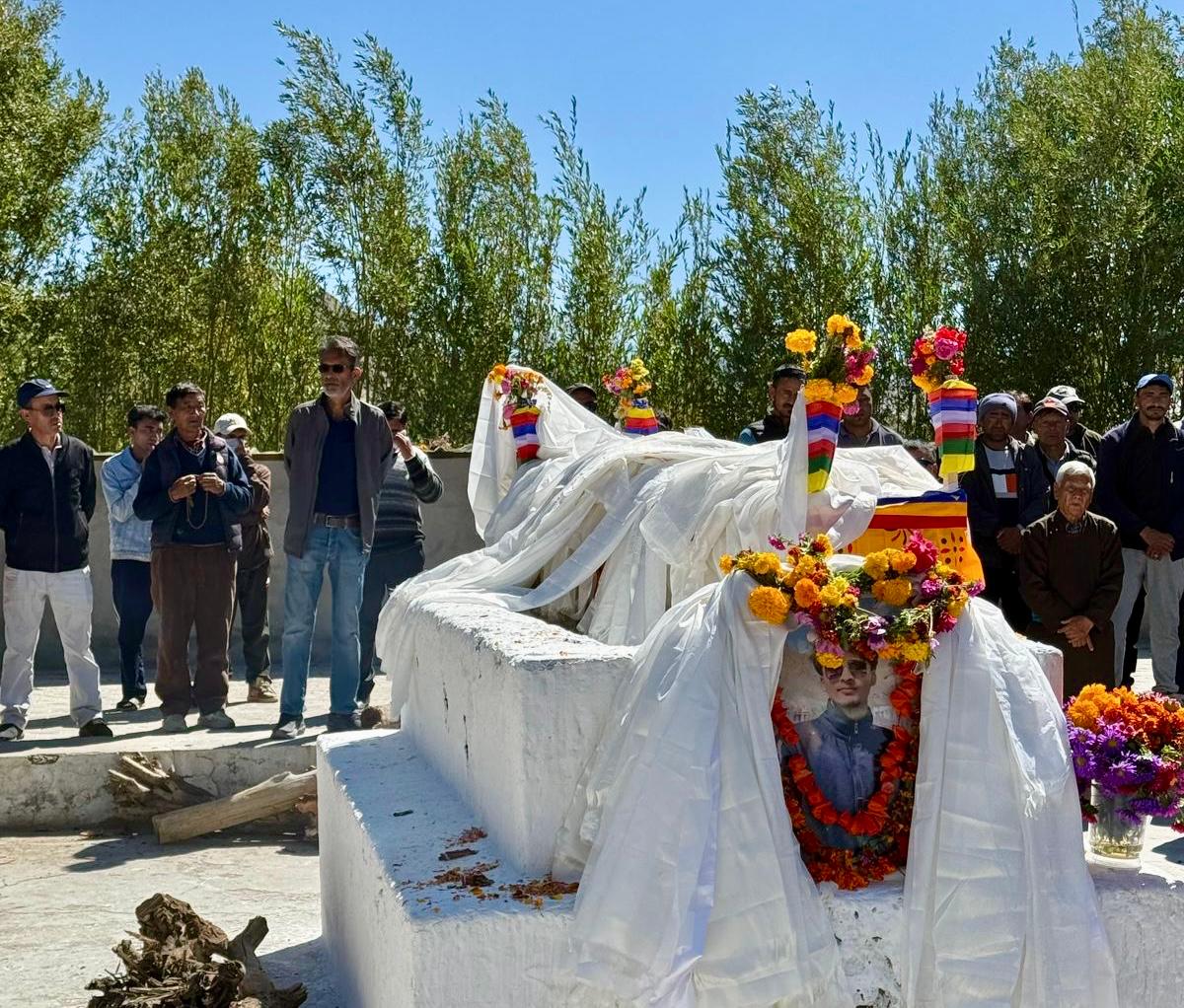 The funeral of Rinchen Dadul, one of the four protesters killed in firing by security forces in Leh on September 24, was held at Devachand cremation ground on Monday amid tight restrictions. Photo: The Wire