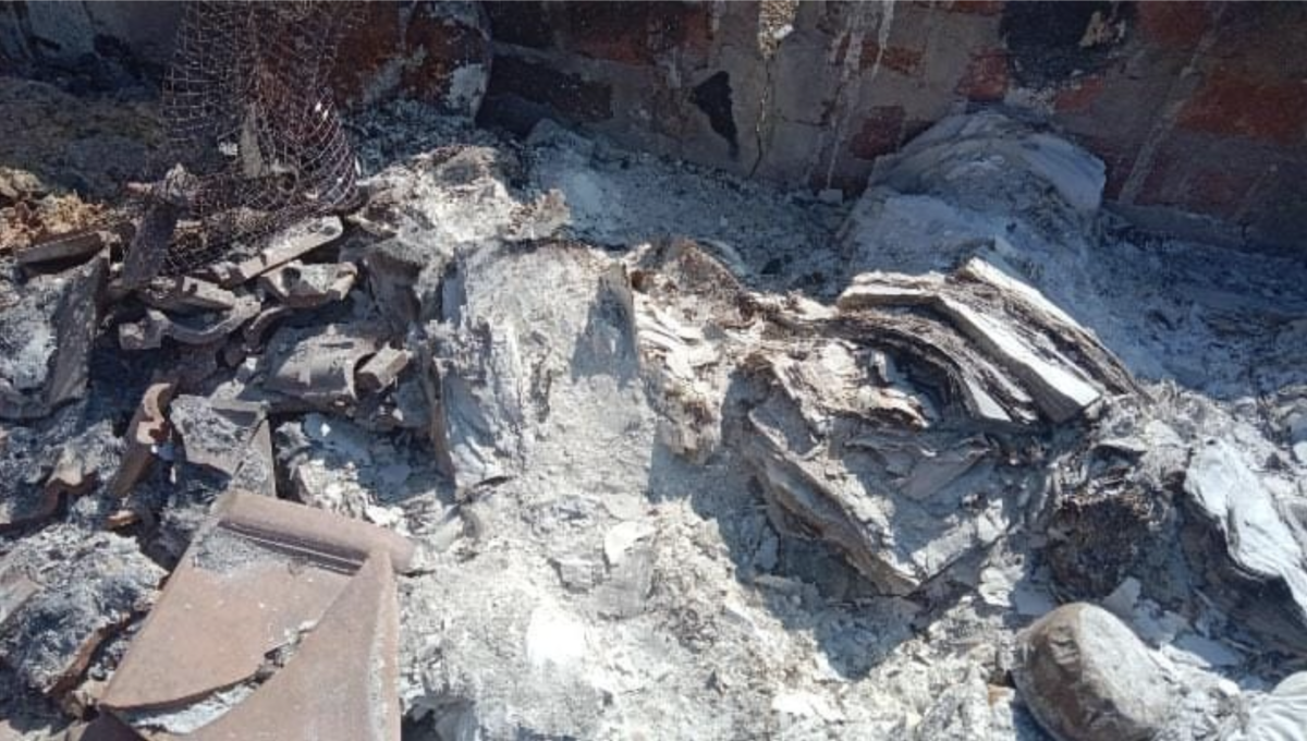 Hundreds of books were reduced to ashes. Photo: The Wire