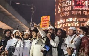 People stage a protest over the death of Sharif Osman Hadi, one of the key leaders in the Bangladesh student uprising, in Dhaka, Bangladesh, Friday, Dec. 19, 2025