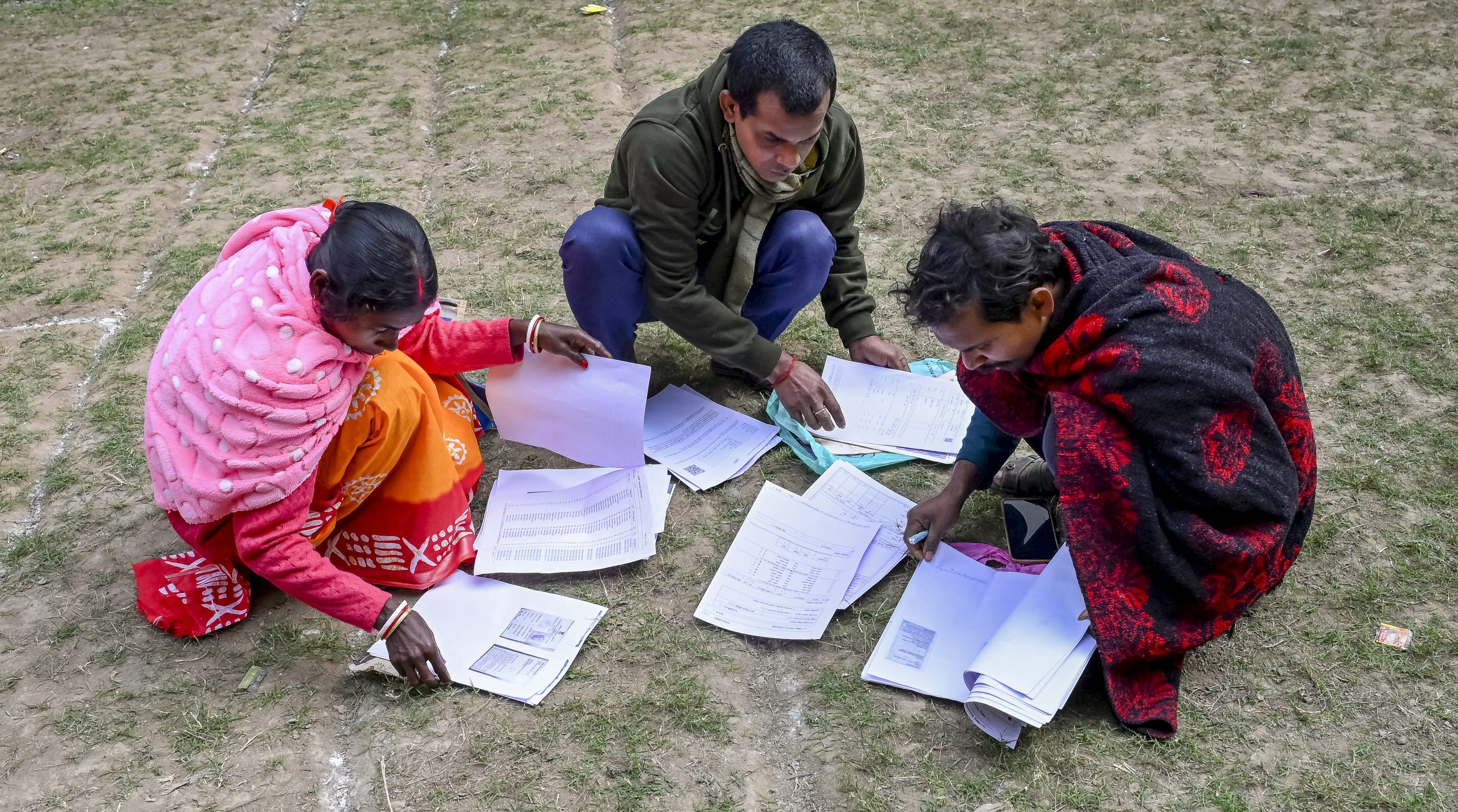 Nadia: People arrange their documents during a hearing under the Special Intensive Revision (SIR) of electoral rolls, in Nadia, West Bengal, Monday, Dec. 29, 2025.