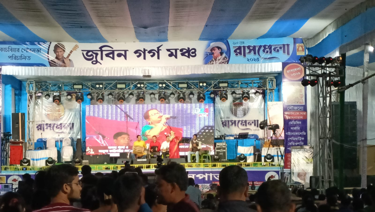 A singer performing on stage during Rash Mela in Cooch Behar, West Bengal.