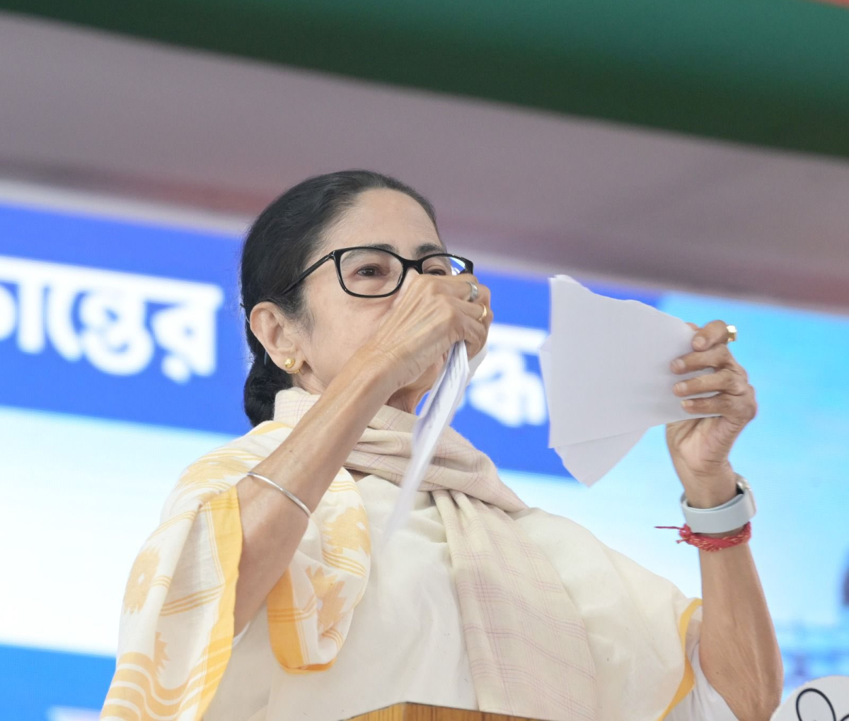 Mamata Banerjee tearing a document at a rally in Photo: Facebook/Mamata Banerjee