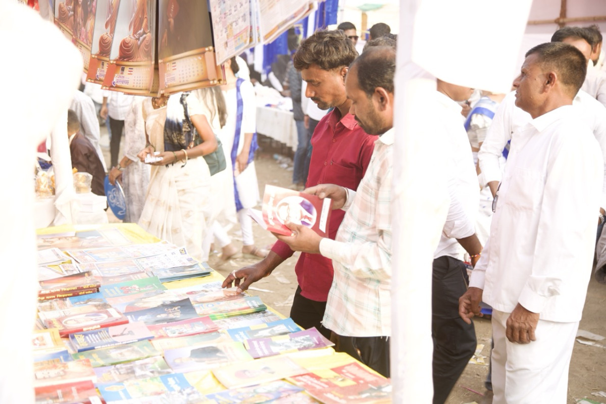 Visitors buy books at the Samvidhaan Book Fair near the Jaystambh. 