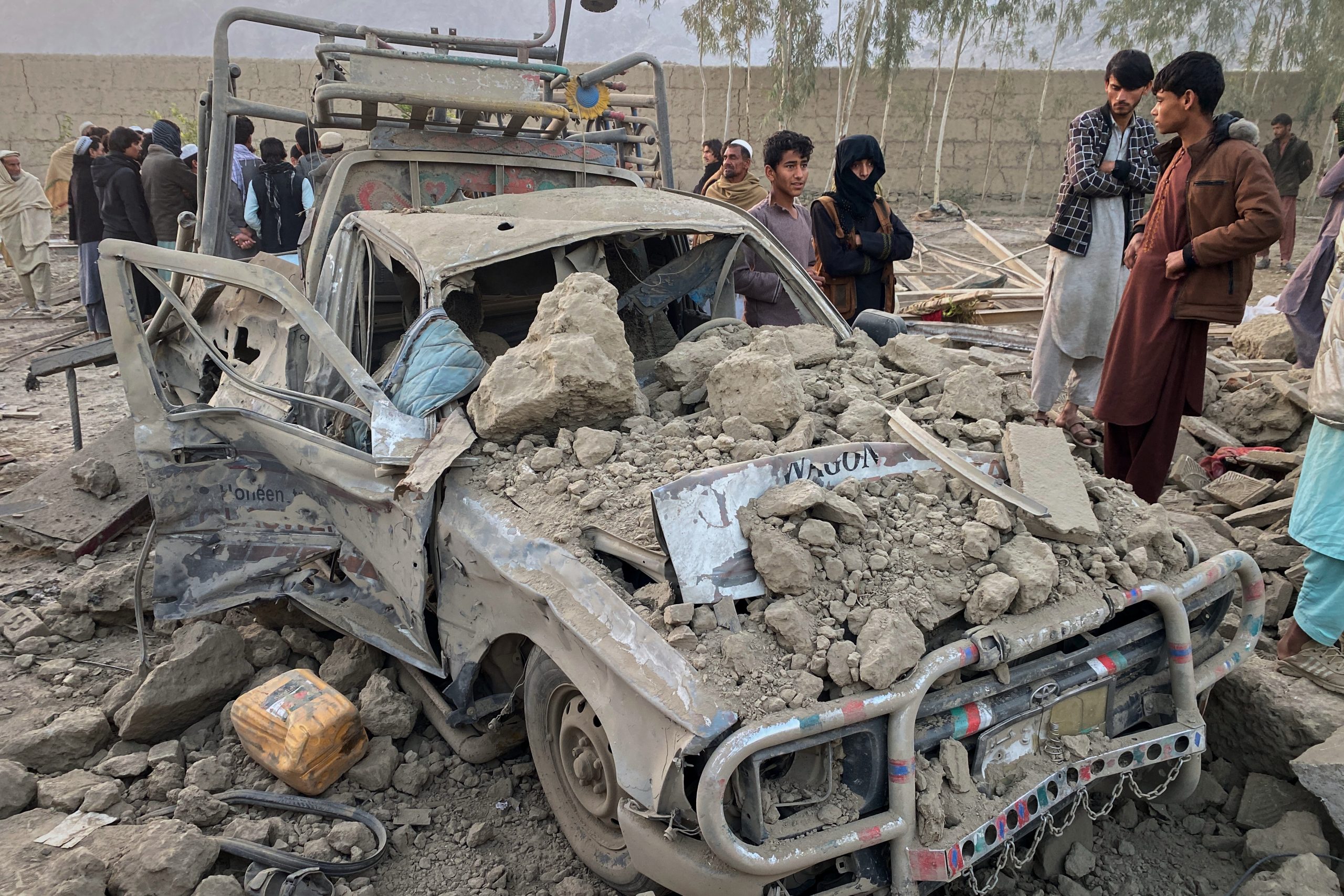 A damaged car seen after a cross-border Pakistani army strike in the Behsud district of Nangarhar province, Afghanistan.