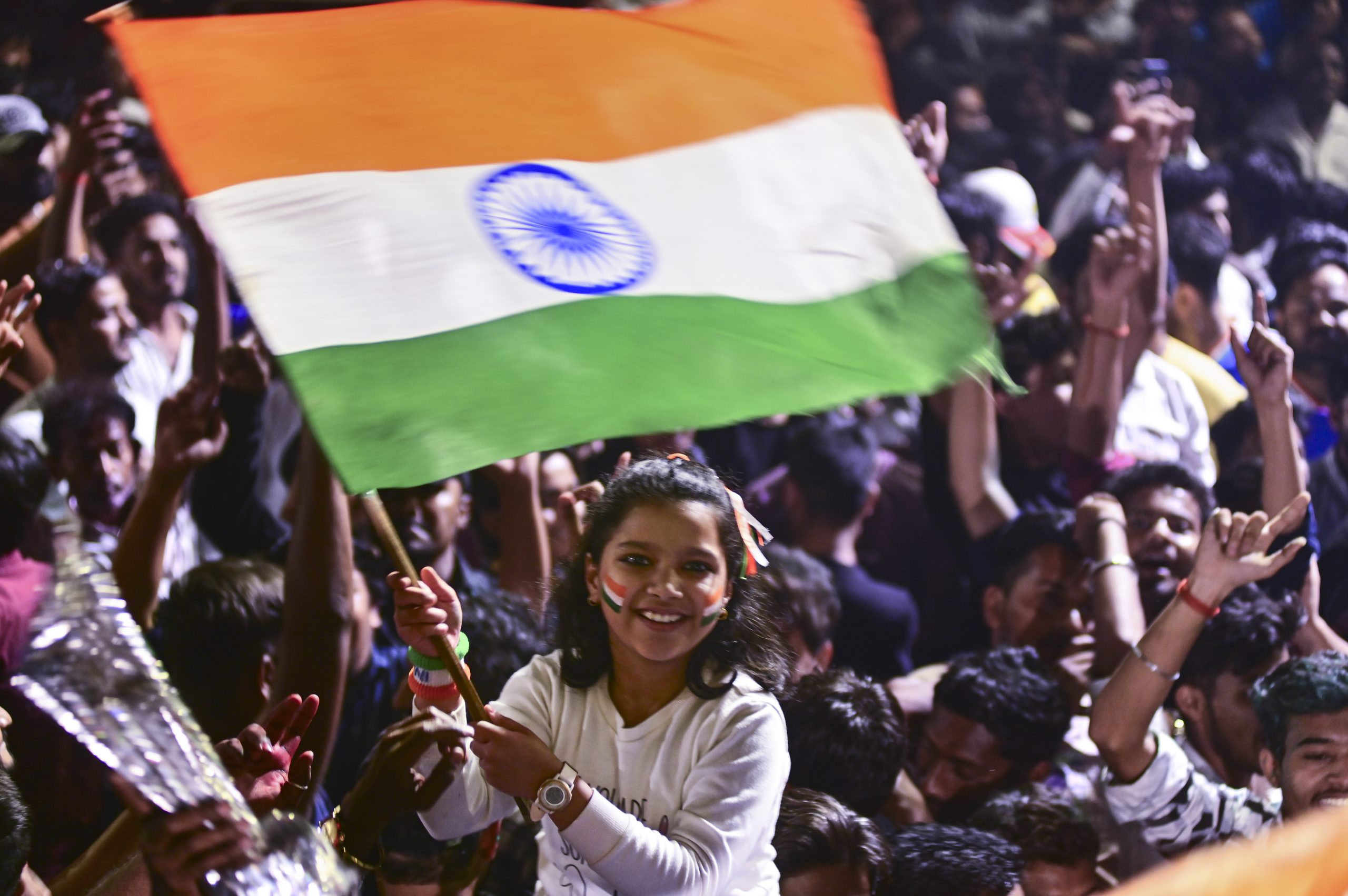 A cricket fan celebrates India's win in Prayagraj, Uttar Pradesh.