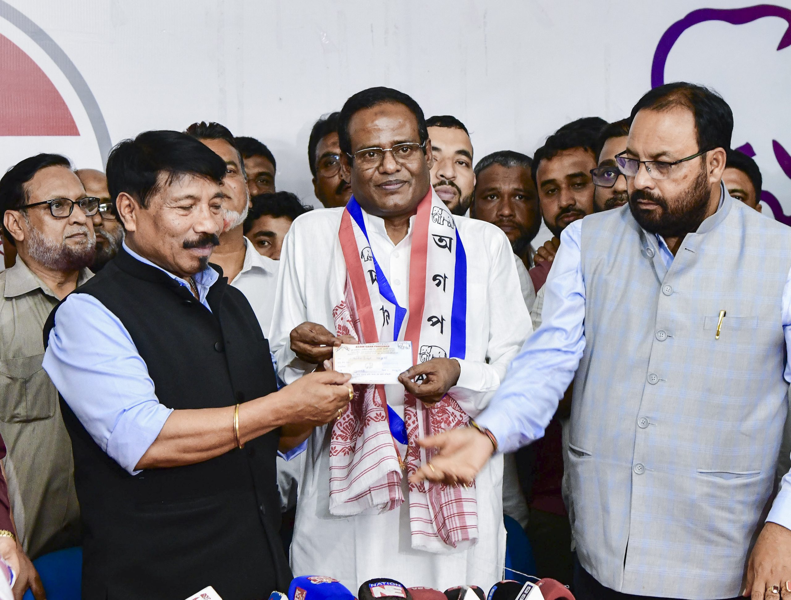AIUDF MLA Karim Uddin Barbhuiya joins the Asom Gana Parishad in the presence of party president Atul Bora and working president Keshav Mahanta 