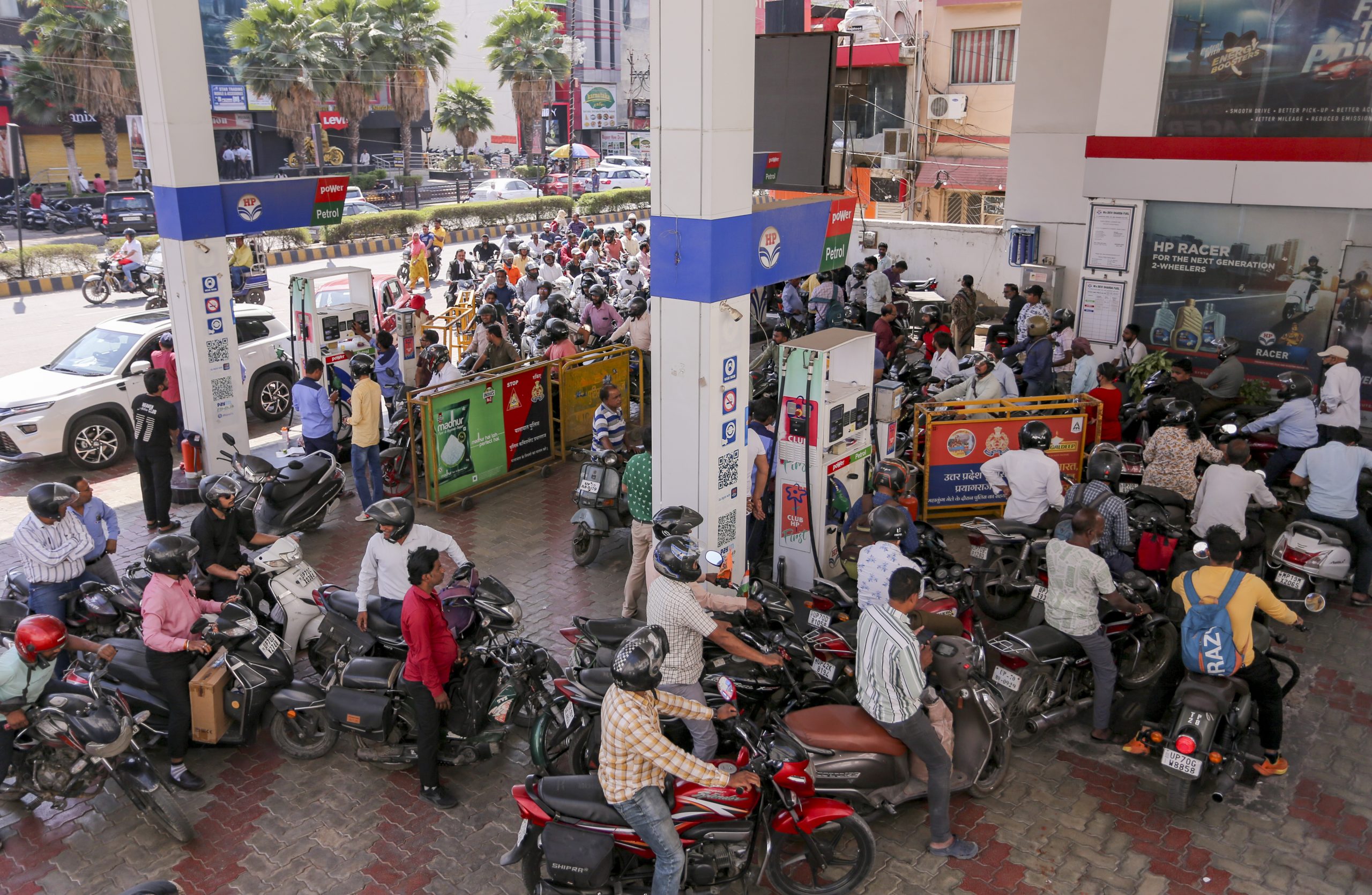 A petrol pump where many people have gathered to fill their vehicles with fuel in Prayagraj, Uttar Pradesh.