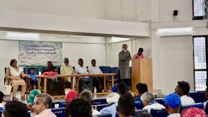 Prasad Chacko speaks to tribals from Padaliya at a meeting in Gujarat's Palanpur. Photo: Tarushi Aswani.