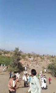 Padaliya's tribals run away as police begin pelting tear gas bombs and lathi charge on December 13, 2025. Photo: By arrangement