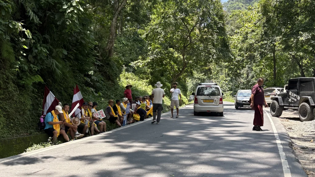 ACT march group resting near Tarkhola, halfway into their march . 