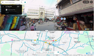 evidence of location where policeman fired a pistol towards protesters, geolocated to J P Chowk by verifying the surrounding shops and buildings