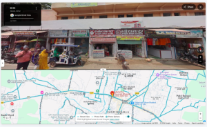 location where police fired a pistol towards protesters, geolocated to J P Chowk by verifying the surrounding shops and buildings