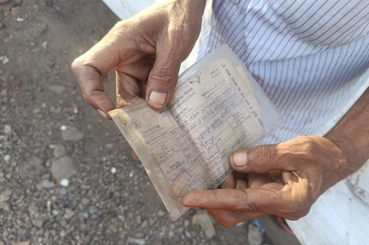 Sirfaan Sheikh Suleman shows his documents from 1995. Photo: Anjali D